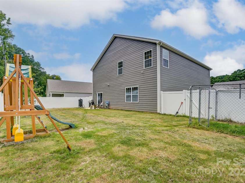 208 Wildflower Drive, Locust, NC 28097.  MLS# CAR4176933, YatesRealty ID 8240. 