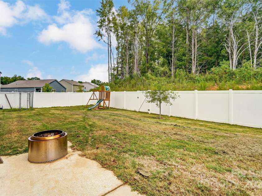 208 Wildflower Drive, Locust, NC 28097.  MLS# CAR4176933, YatesRealty ID 8240. 