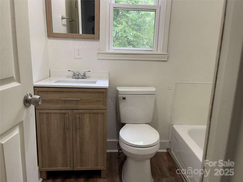 215 Mahan Street, Concord, NC 28025.  MLS# CAR4250870, YatesRealty ID 8242. Bathroom om Left side