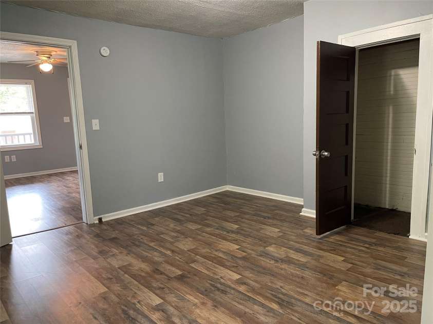 215 Mahan Street, Concord, NC 28025.  MLS# CAR4250870, YatesRealty ID 8242. Bedroom on right side