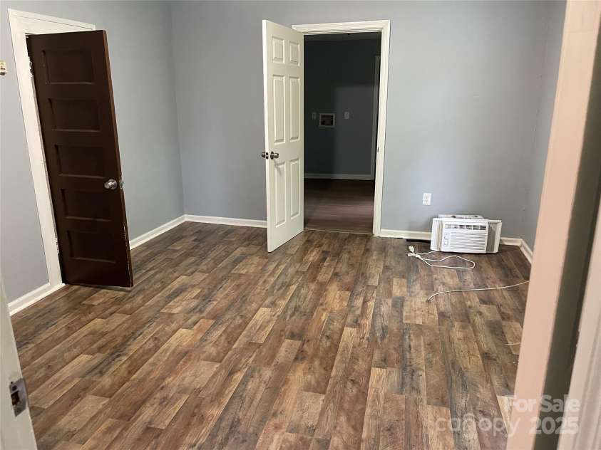 215 Mahan Street, Concord, NC 28025.  MLS# CAR4250870, YatesRealty ID 8242. Bedroom on right side