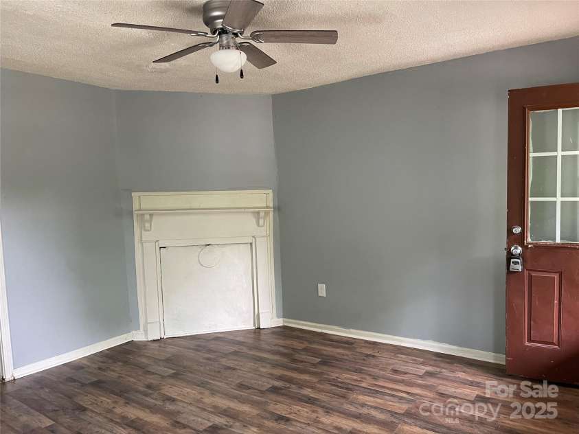 215 Mahan Street, Concord, NC 28025.  MLS# CAR4250870, YatesRealty ID 8242. Family room entry on Left side