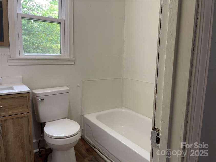 215 Mahan Street, Concord, NC 28025.  MLS# CAR4250870, YatesRealty ID 8242. Full bath on Left side