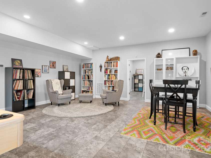 940 Hawk Ridge Drive, Mill Spring, NC 28756.  MLS# CAR4227450, YatesRealty ID 8244. Lower level/basement finished space with tons of options for entertainment, gym, office space etc.