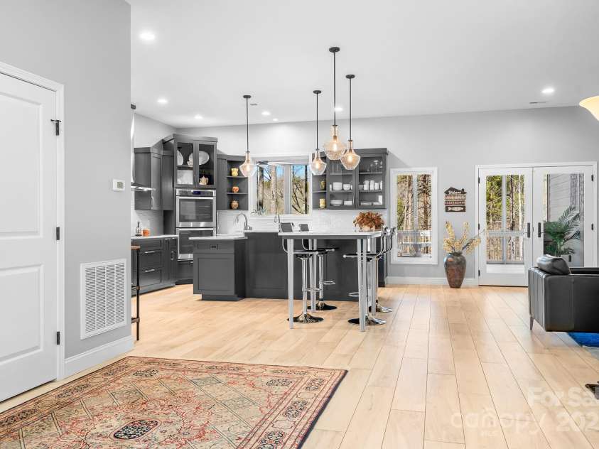 940 Hawk Ridge Drive, Mill Spring, NC 28756.  MLS# CAR4227450, YatesRealty ID 8244. Modern interior with gourmet kitchens and spa like living spaces!