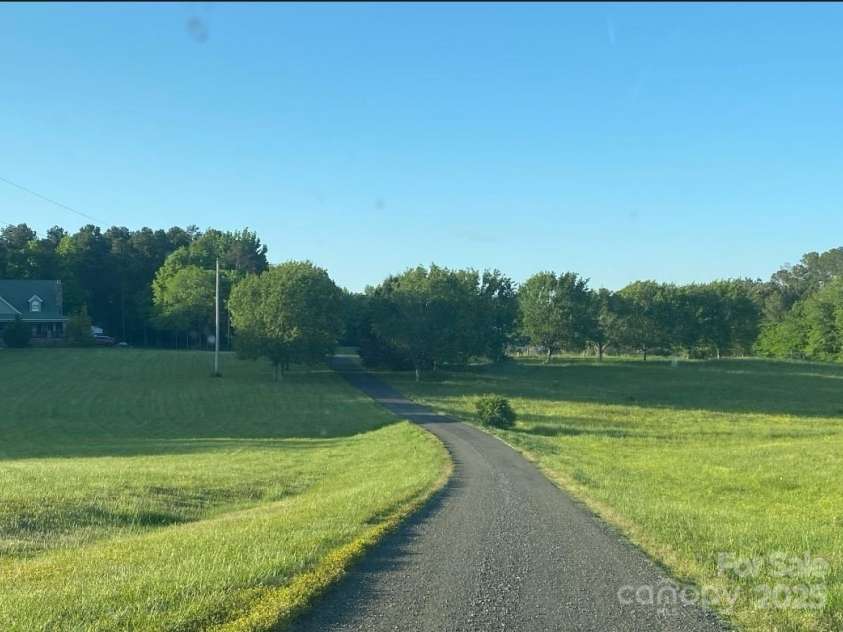 105 Eubanks Road, Monroe, NC 28112.  MLS# CAR4309646, YatesRealty ID 8250. Driving onto Property