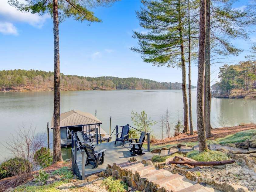 221 Ridge Top Drive, Connelly Springs, NC 28612.  MLS# CAR4221526, YatesRealty ID 8251. Waterfront with covered boat dock and sitting area