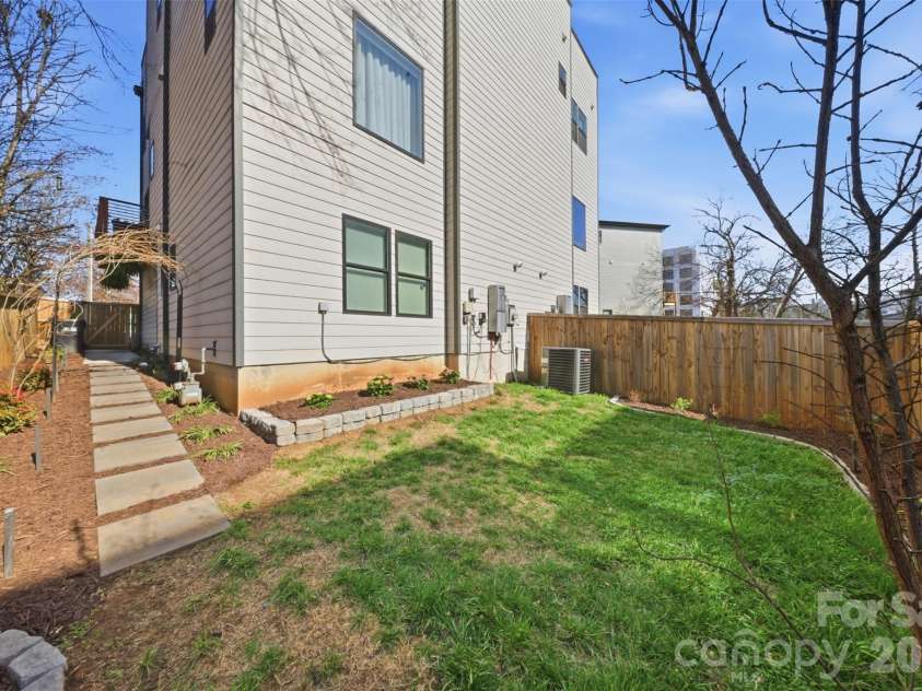 1602 Julia Maulden Place, Charlotte, NC 28206.  MLS# CAR4356693, YatesRealty ID 8256. Fenced in backyard