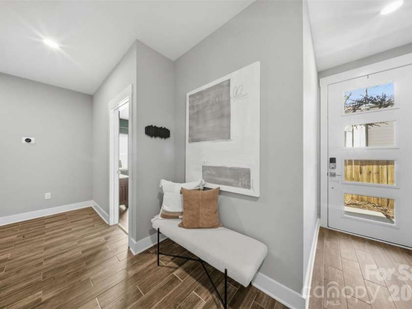 1602 Julia Maulden Place, Charlotte, NC 28206.  MLS# CAR4356693, YatesRealty ID 8256. Foyer and hallway