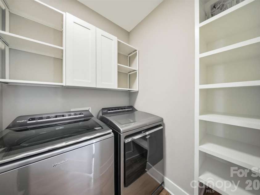 1602 Julia Maulden Place, Charlotte, NC 28206.  MLS# CAR4356693, YatesRealty ID 8256. Laundry room on main level