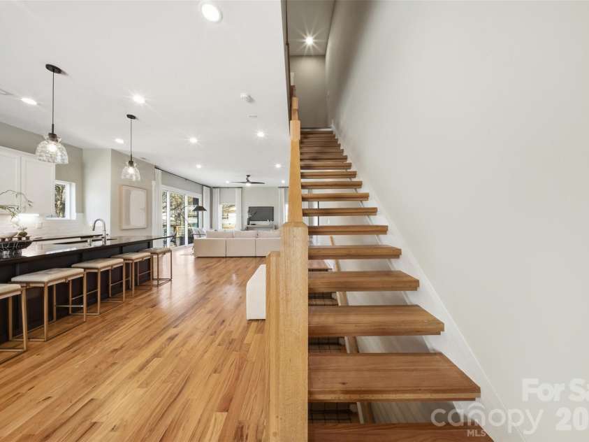 1602 Julia Maulden Place, Charlotte, NC 28206.  MLS# CAR4356693, YatesRealty ID 8256. Stairwell up to third floor