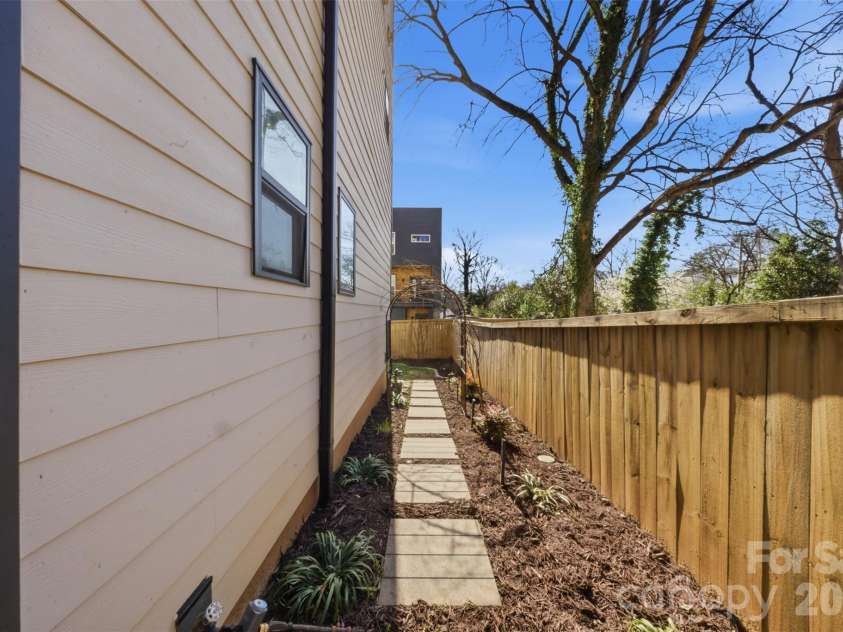 1602 Julia Maulden Place, Charlotte, NC 28206.  MLS# CAR4356693, YatesRealty ID 8256. Walkway to back yard