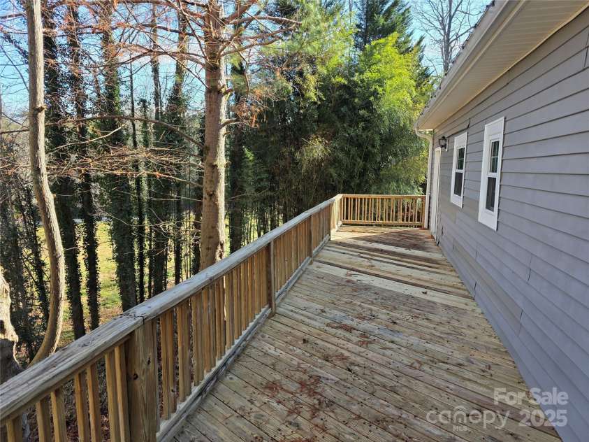 12 White Squirrel Lane, Hendersonville, NC 28739.  MLS# CAR4328399, YatesRealty ID 8261. Back Deck