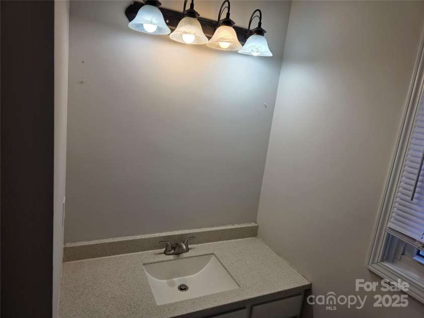 12 White Squirrel Lane, Hendersonville, NC 28739.  MLS# CAR4328399, YatesRealty ID 8261. Basement Bath