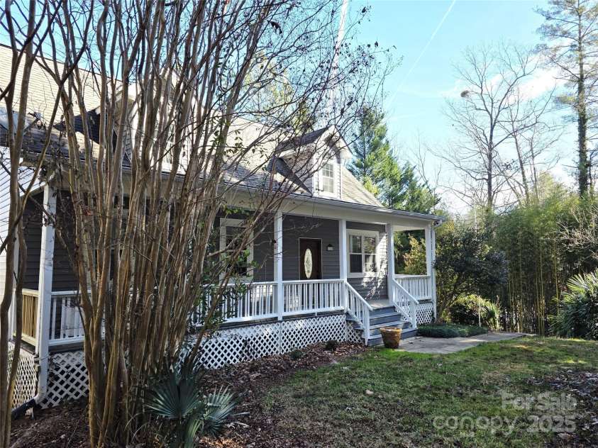 12 White Squirrel Lane, Hendersonville, NC 28739.  MLS# CAR4328399, YatesRealty ID 8261. Corner Front