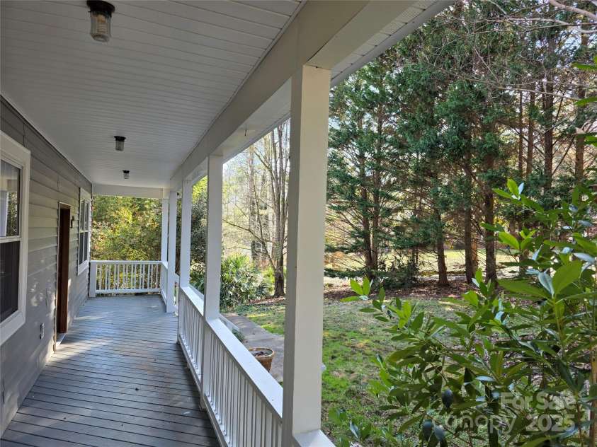 12 White Squirrel Lane, Hendersonville, NC 28739.  MLS# CAR4328399, YatesRealty ID 8261. Covered Front Porch