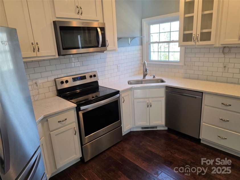 12 White Squirrel Lane, Hendersonville, NC 28739.  MLS# CAR4328399, YatesRealty ID 8261. Kitchen Window to Deck