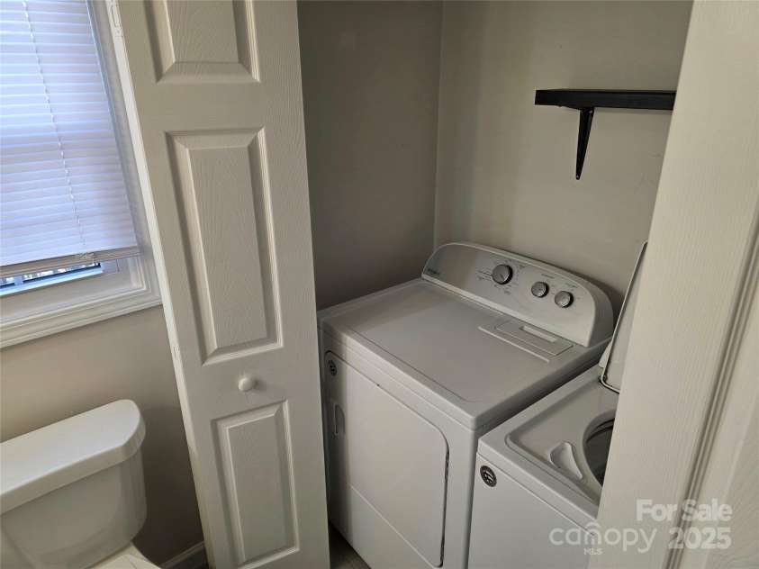12 White Squirrel Lane, Hendersonville, NC 28739.  MLS# CAR4328399, YatesRealty ID 8261. Laundry in Half Bath