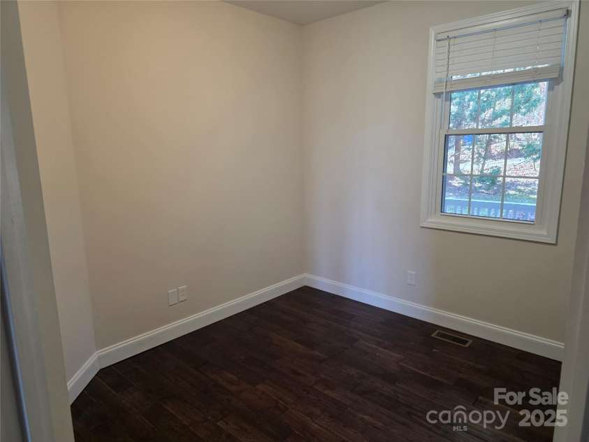12 White Squirrel Lane, Hendersonville, NC 28739.  MLS# CAR4328399, YatesRealty ID 8261. Office with closet off Primary BR
