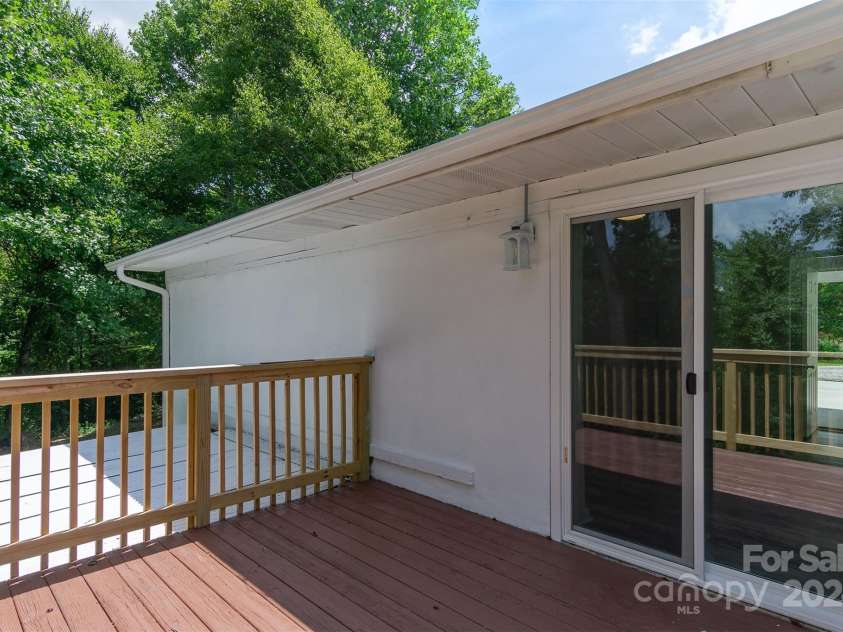 468 Deer Park Lake Road, Spruce Pine, NC 28777.  MLS# CAR4068097, YatesRealty ID 8263. Back deck unit 1