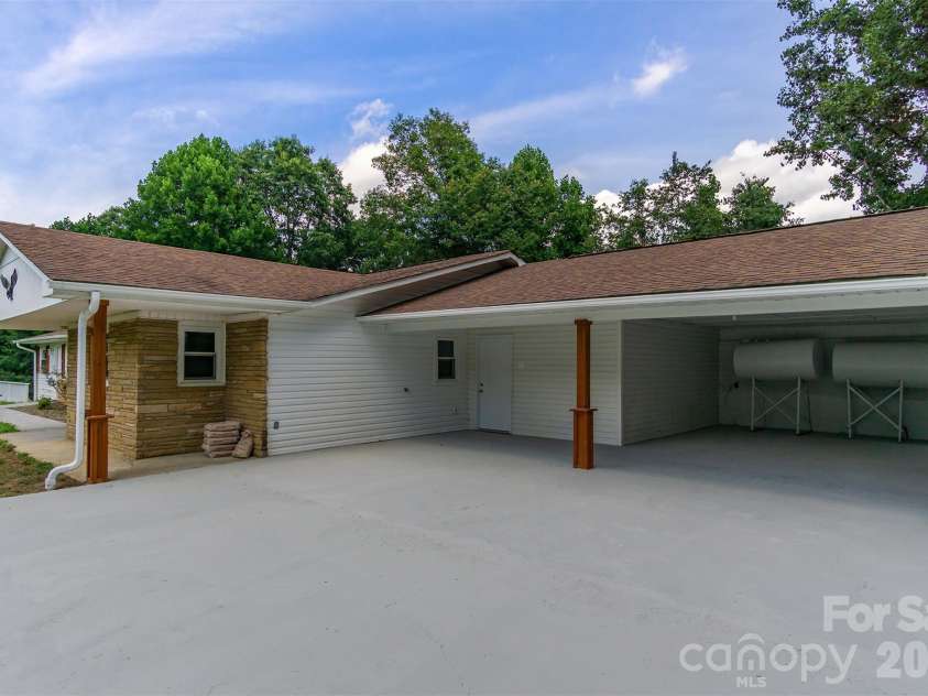 468 Deer Park Lake Road, Spruce Pine, NC 28777.  MLS# CAR4068097, YatesRealty ID 8263. Covered carport