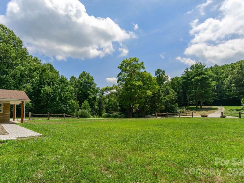 468 Deer Park Lake Road, Spruce Pine, NC 28777.  MLS# CAR4068097, YatesRealty ID 8263. Large flat Yard