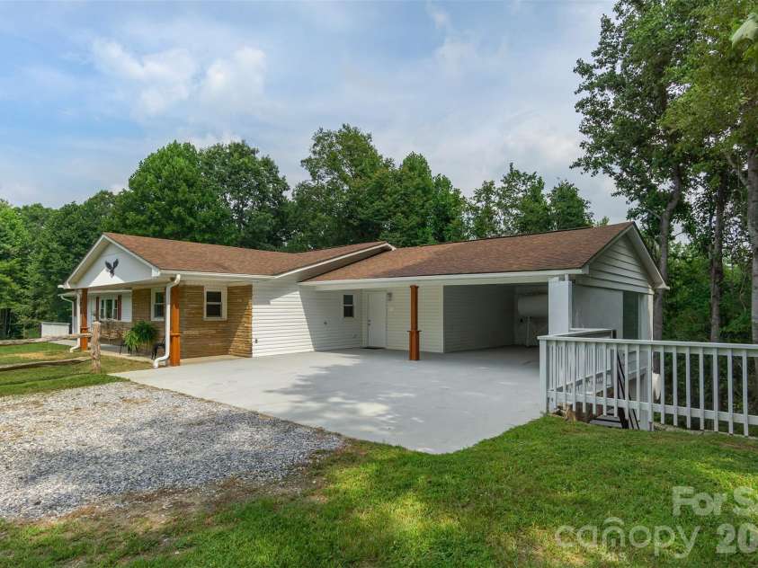 468 Deer Park Lake Road, Spruce Pine, NC 28777.  MLS# CAR4068097, YatesRealty ID 8263. Unit 1 carport