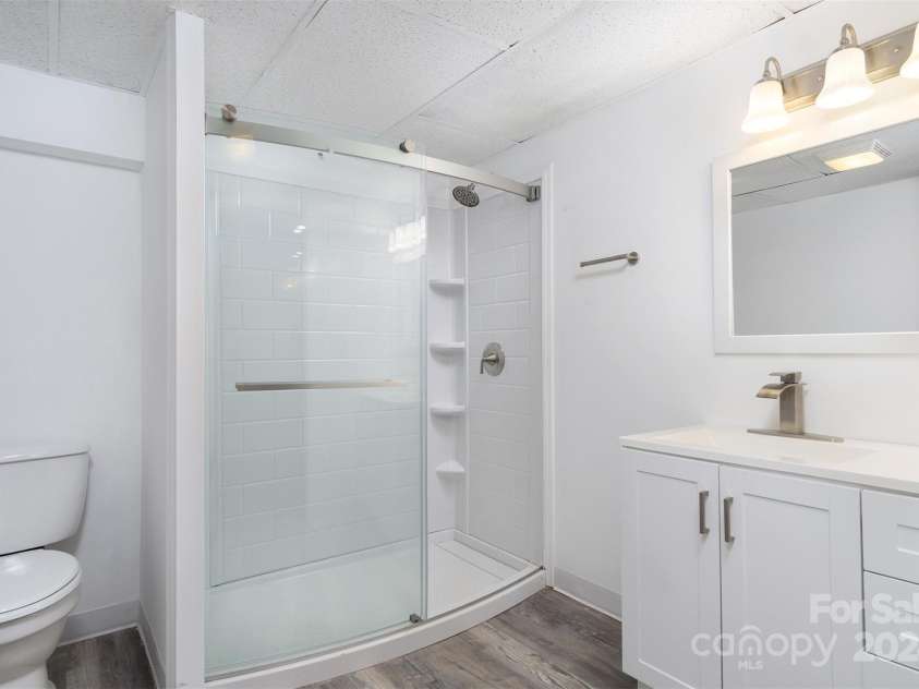 468 Deer Park Lake Road, Spruce Pine, NC 28777.  MLS# CAR4068097, YatesRealty ID 8263. Unit 3 New bathroom