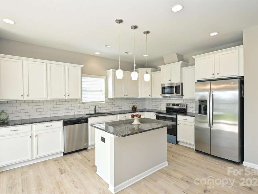 1309 Afternoon Sun Road, Matthews, NC 28104.  MLS# CAR4233925, YatesRealty ID 8267. 