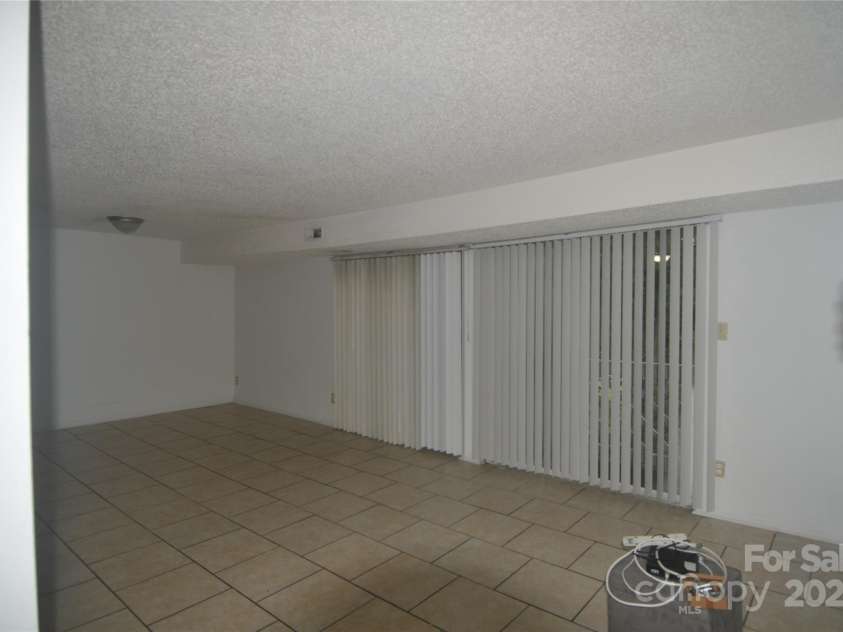 9500 L Shannon Green Drive, Charlotte, NC 28213.  MLS# CAR4170550, YatesRealty ID 827. Den