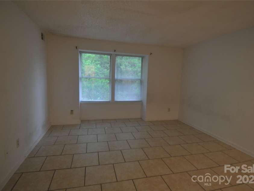 9500 L Shannon Green Drive, Charlotte, NC 28213.  MLS# CAR4170550, YatesRealty ID 827. Primary bedroom