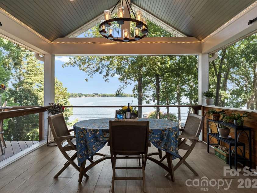 16318 Belle Isle Drive, Cornelius, NC 28031.  MLS# CAR4292940, YatesRealty ID 8272. Beaded board ceilings and cable wire railing systems for unobstructed views