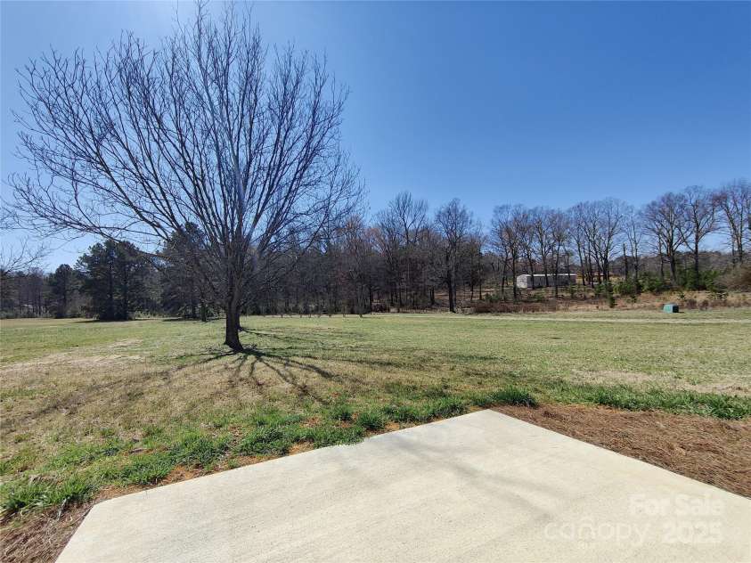 9609 Stokes Ferry Road, Gold Hill, NC 28071.  MLS# CAR4161798, YatesRealty ID 8275. Back View