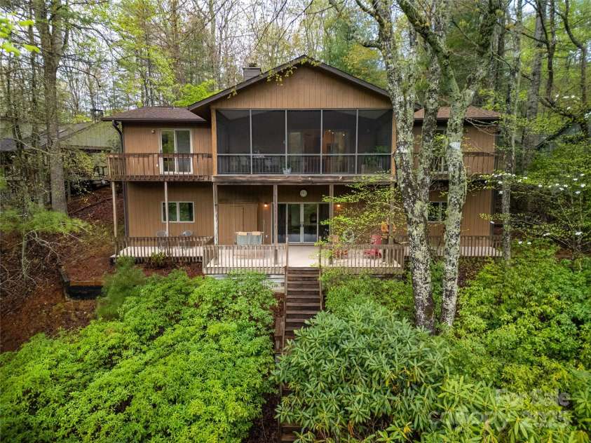 228 Echota Lane, Brevard, NC 28712.  MLS# CAR4249014, YatesRealty ID 8276. House View from Lake