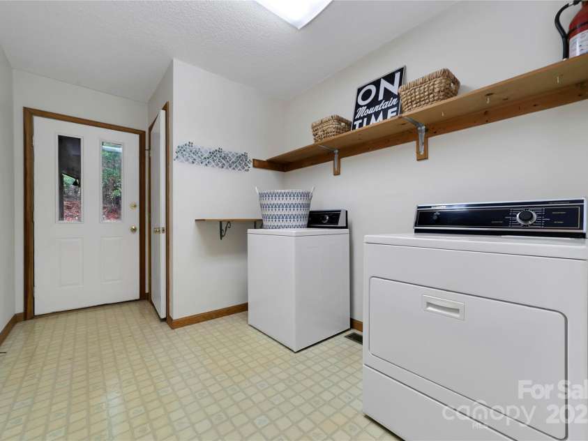 228 Echota Lane, Brevard, NC 28712.  MLS# CAR4249014, YatesRealty ID 8276. Laundry/Mud room- Main level