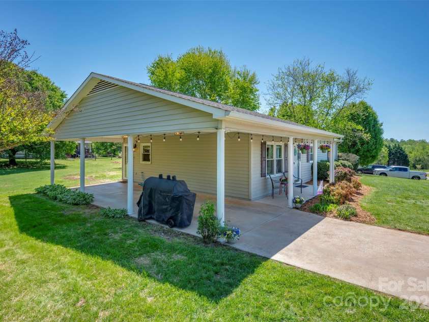 188 EAST FORK Drive, Ellenboro, NC 28804.  MLS# CAR4248404, YatesRealty ID 8277. Front Porch & Carport
