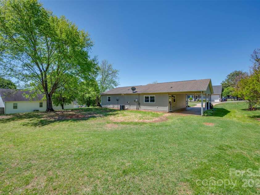 188 EAST FORK Drive, Ellenboro, NC 28804.  MLS# CAR4248404, YatesRealty ID 8277. Outside Carport