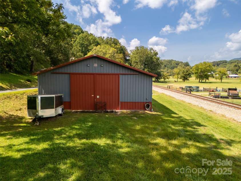 50 Holland Ridge Drive, Candler, NC 28715.  MLS# CAR4312644, YatesRealty ID 828. 