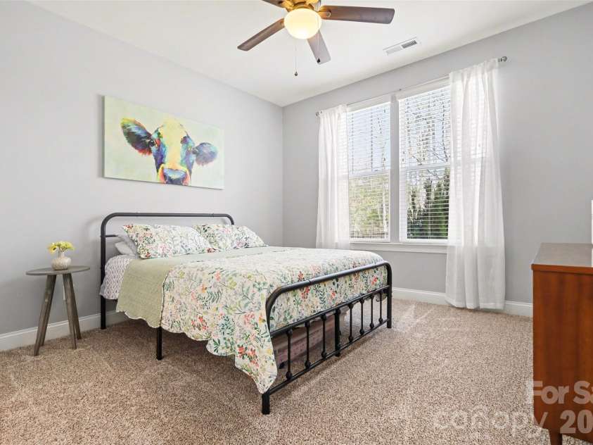 174 Country Lake Drive, Mooresville, NC 28115.  MLS# CAR4361802, YatesRealty ID 8293. Downstairs bedroom with new carpet.
