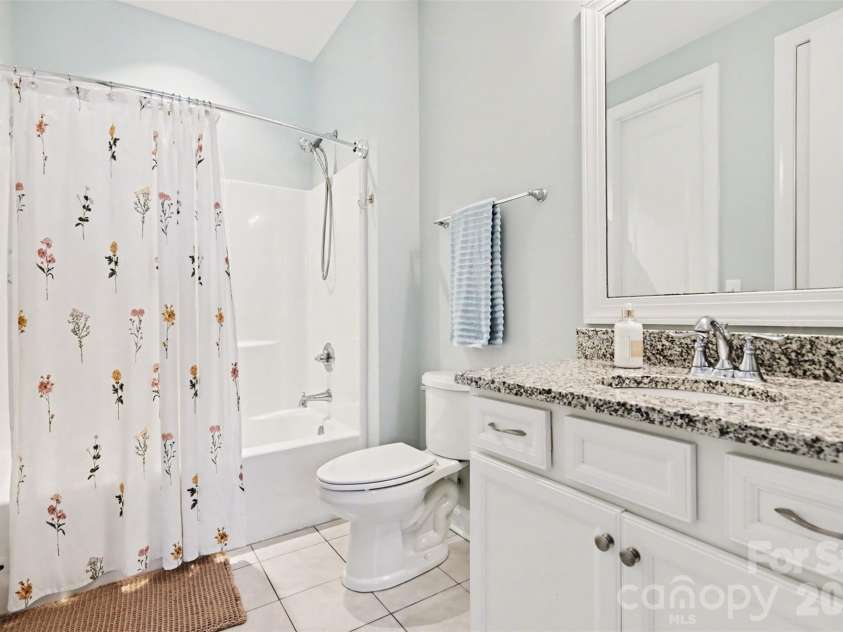 174 Country Lake Drive, Mooresville, NC 28115.  MLS# CAR4361802, YatesRealty ID 8293. Downstairs private full bath.