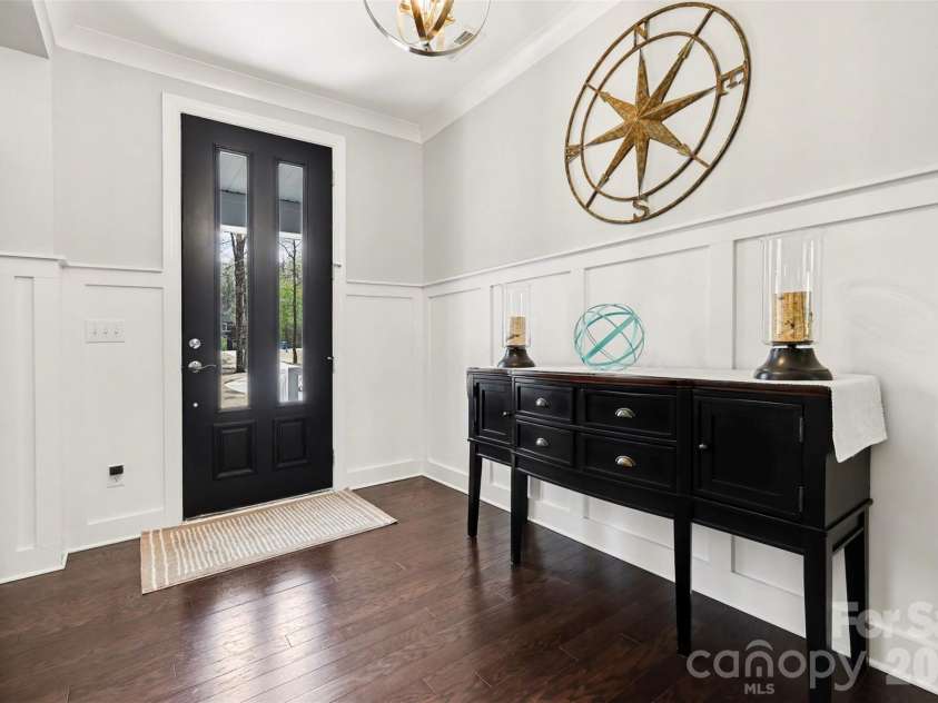 174 Country Lake Drive, Mooresville, NC 28115.  MLS# CAR4361802, YatesRealty ID 8293. Foyer open to dining which is currently used as an office. The dining space in the kitchen area is large enough for a big dining table!