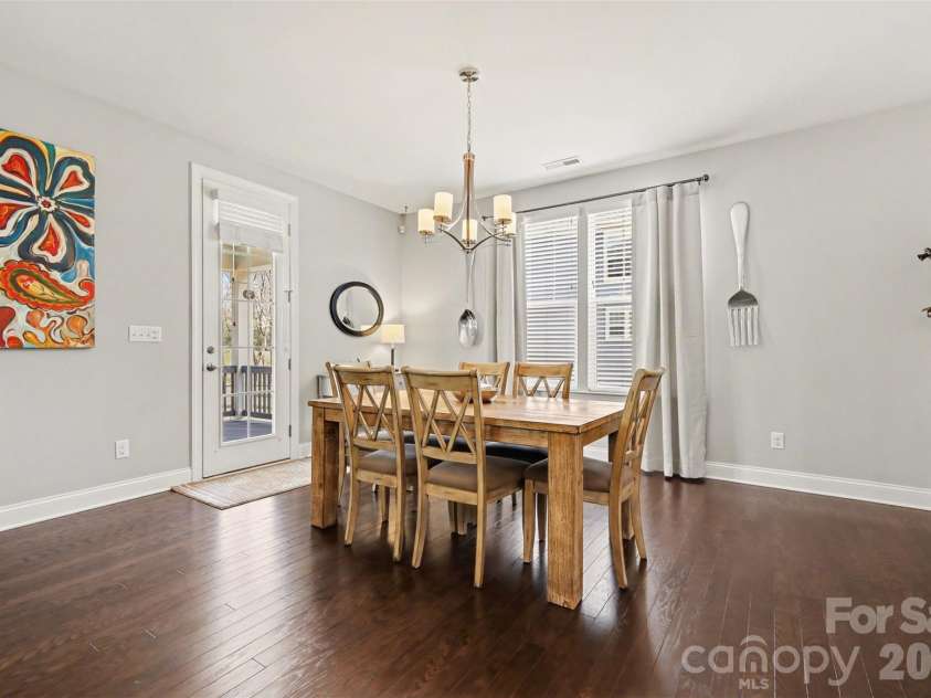 174 Country Lake Drive, Mooresville, NC 28115.  MLS# CAR4361802, YatesRealty ID 8293. Oversized breakfast area leads out to the covered porch. 