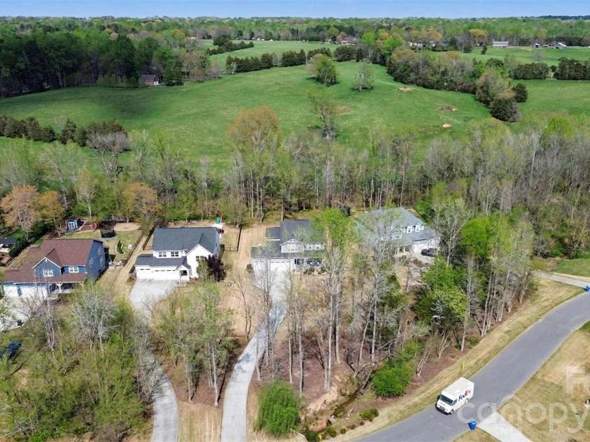 174 Country Lake Drive, Mooresville, NC 28115.  MLS# CAR4361802, YatesRealty ID 8293. Second from the right.
