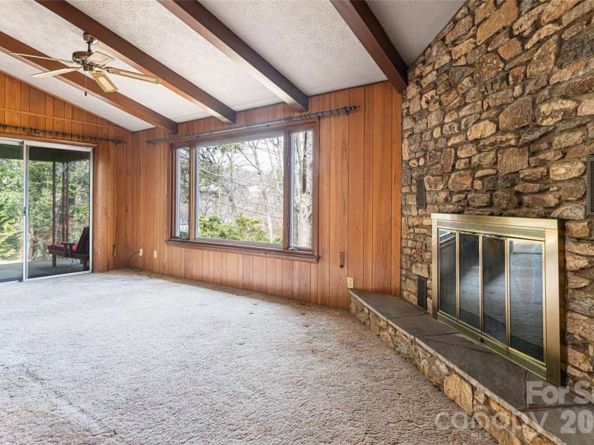 180 Lakewood Drive, Asheville, NC 28803.  MLS# CAR4341073, YatesRealty ID 8297. 2 Bedroom Living Room with Fireplace
