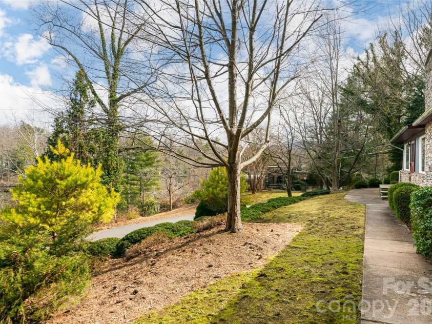 180 Lakewood Drive, Asheville, NC 28803.  MLS# CAR4341073, YatesRealty ID 8297. Front of Duplex Home