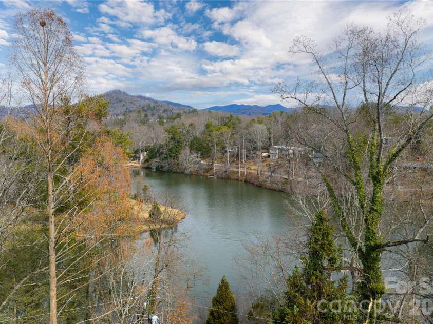 180 Lakewood Drive, Asheville, NC 28803.  MLS# CAR4341073, YatesRealty ID 8297. Lake accross the street