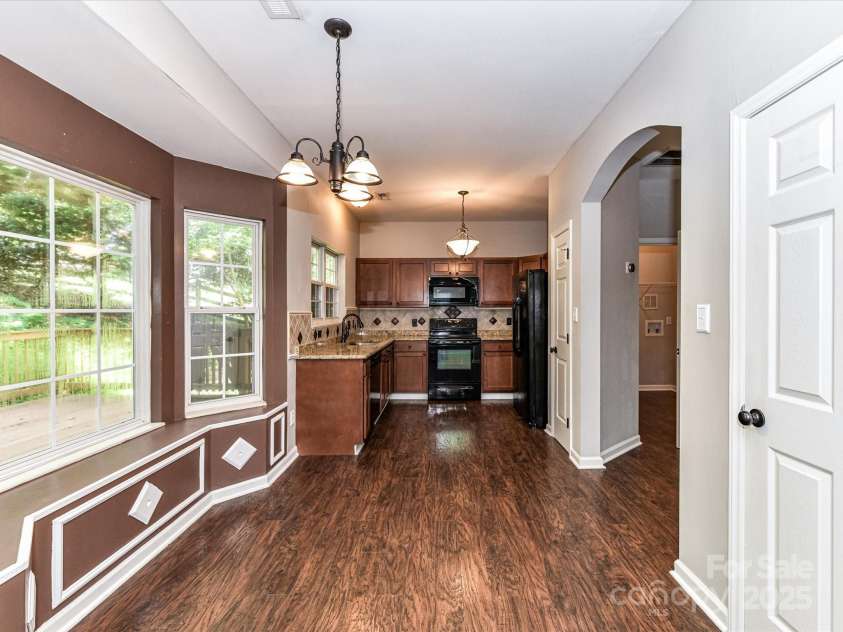 6027 Edinmeadow Lane, Charlotte, NC 28269.  MLS# CAR4284347, YatesRealty ID 8297. 