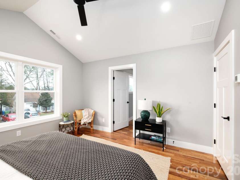 69 Vandalia Avenue, Asheville, NC 28806.  MLS# CAR4351199, YatesRealty ID 8298. Spacious Primary Suite Features a Vaulted Ceiling and Full Bath