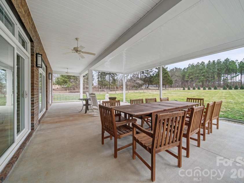 1296 Ben Black Road, Midland, NC 28107.  MLS# CAR4349291, YatesRealty ID 8300. Covered Back Patio w/ ample space to entertain!
