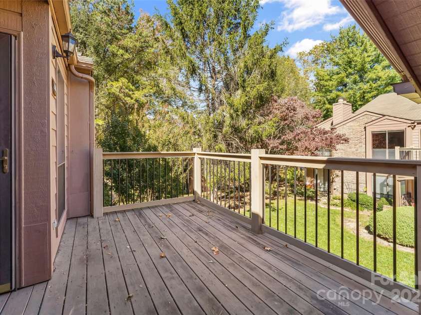 44 Ravencroft Lane, Asheville, NC 28803.  MLS# CAR4192799, YatesRealty ID 8303. End unit overlooking courtyard
